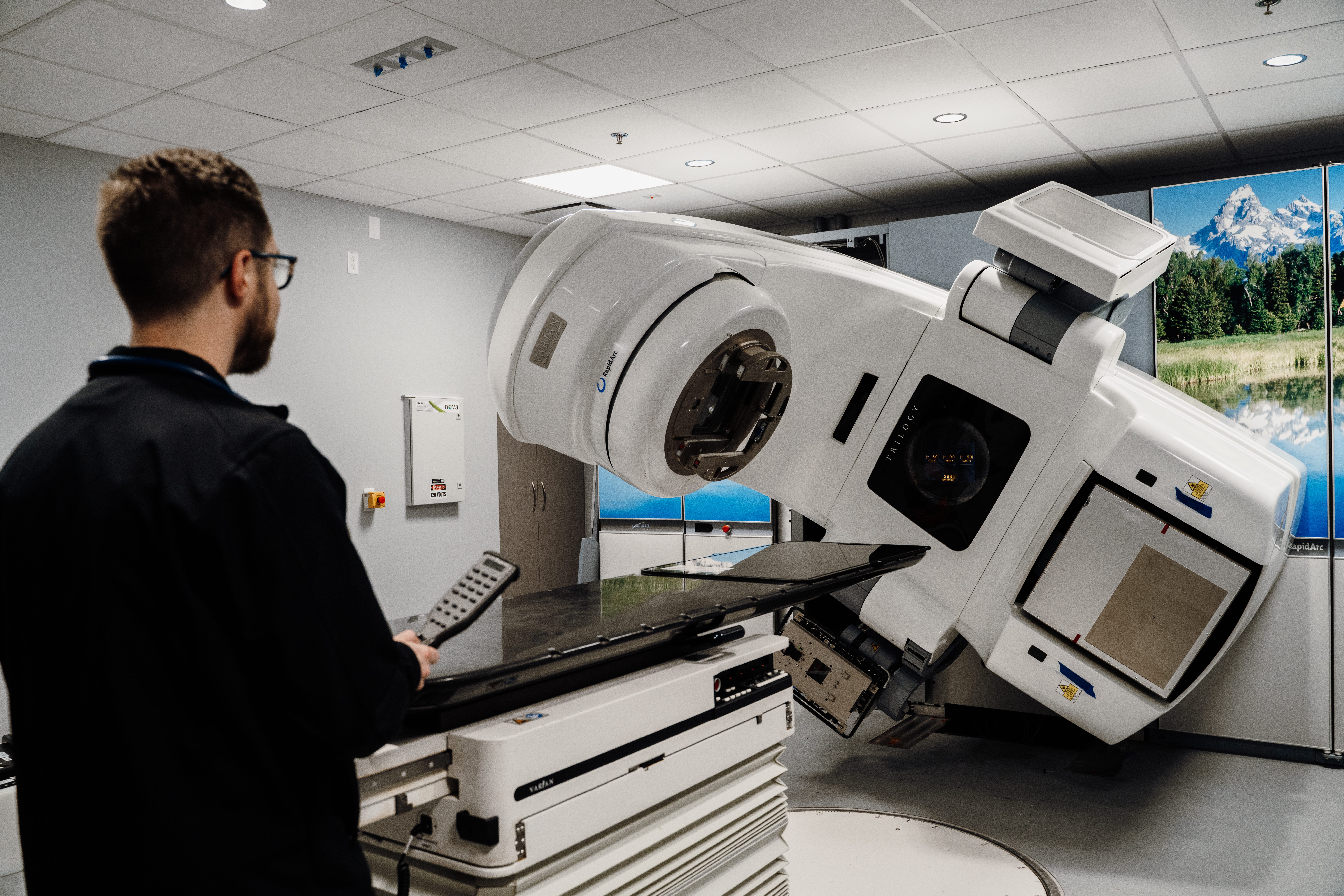 Man operating the Radiation Lab Equipment