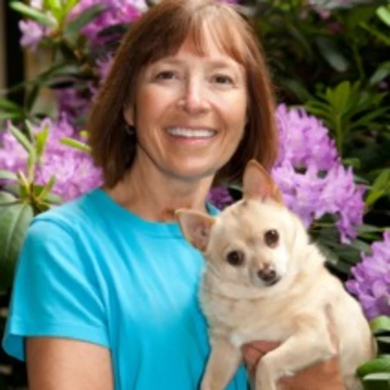 Dr. Erdman holding a dog at Laurelwood Animal Hospital Dr. Erdman holding a dog at Laurelwood Animal Hospital