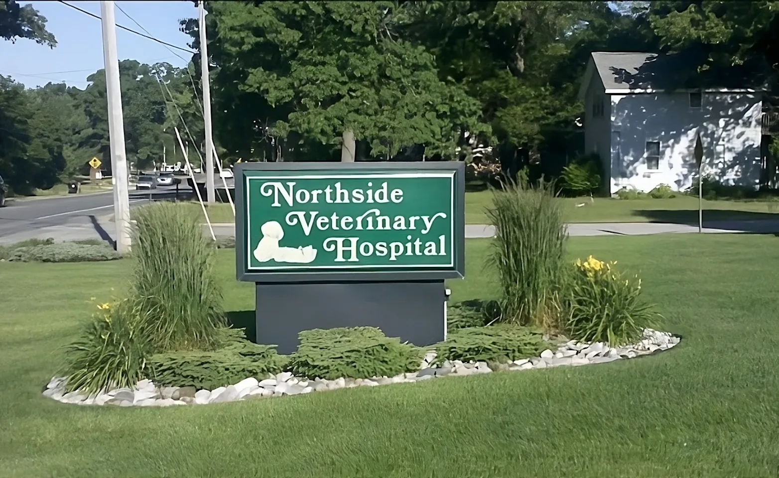 Northside Veterinary Hospital sign on grass Northside Veterinary Hospital sign on grass