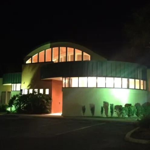 Animal Care Center of Panama City Beach at night with the lights on outside