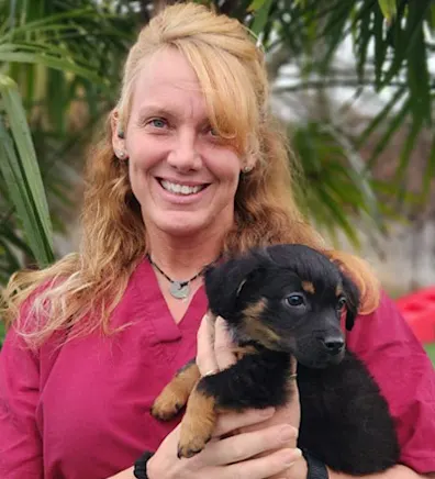 Alisa holding a puppy Alisa holding a puppy