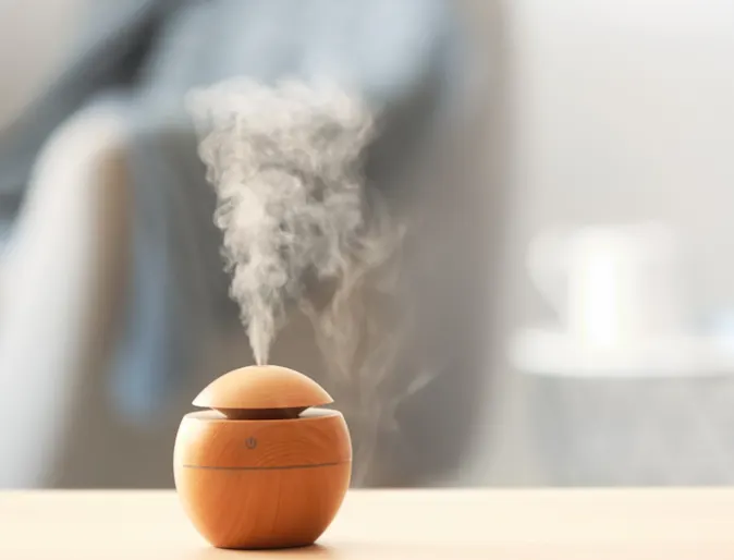 Aroma diffuser sitting on a table Aroma diffuser sitting on a table
