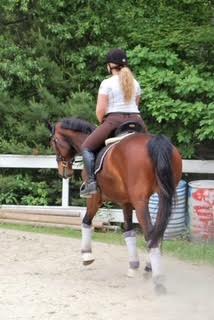 Woman riding a horse