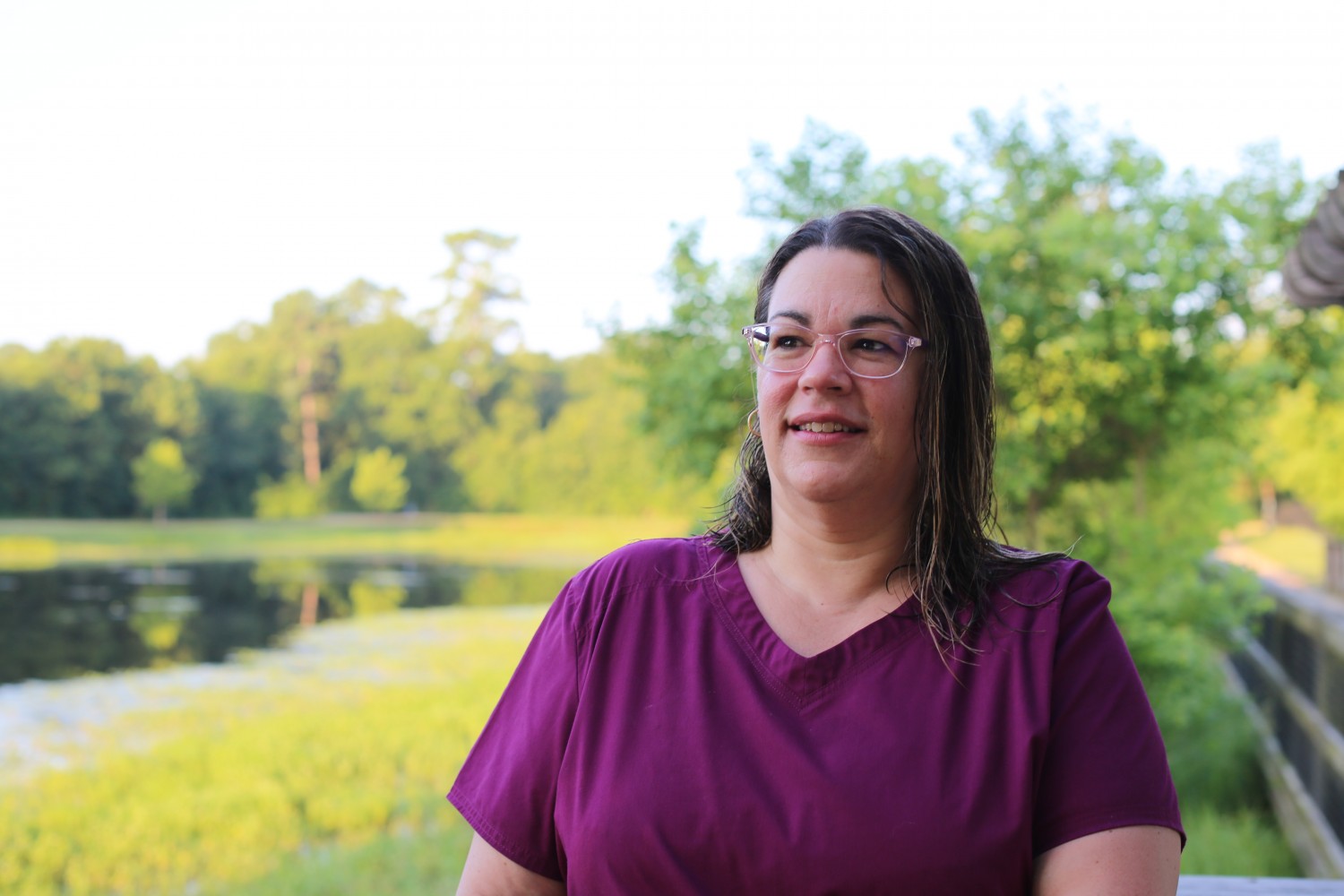 Stina in front of a lake