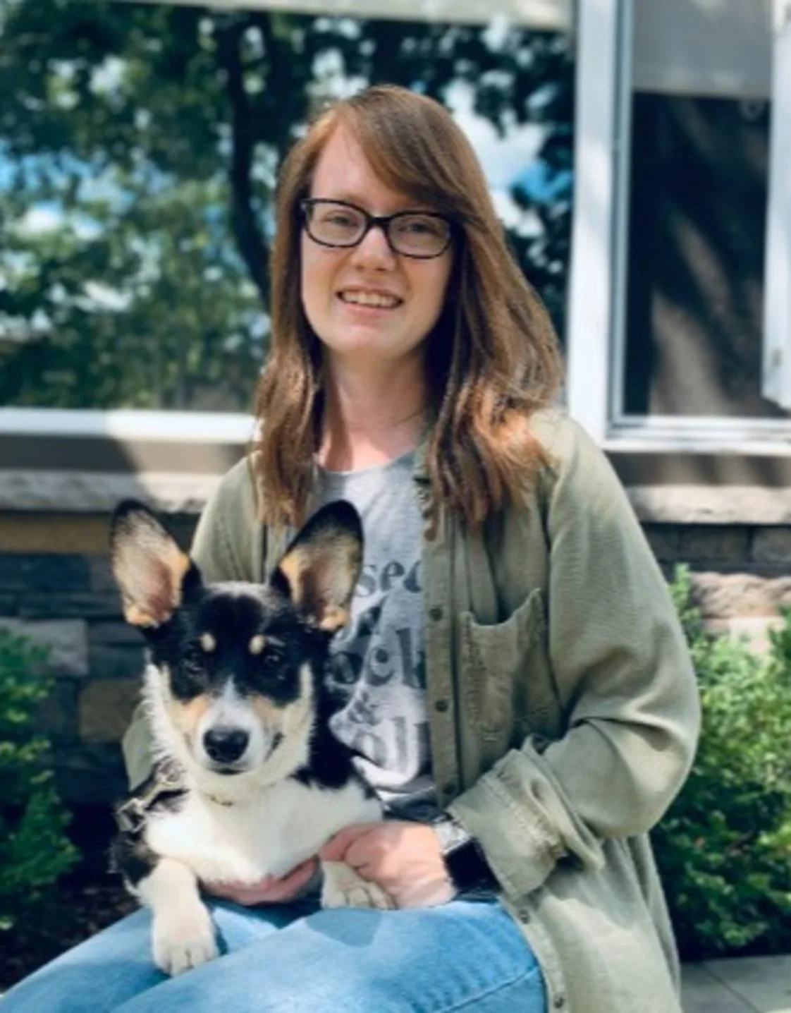 Morgan holding a small dog Morgan holding a small dog
