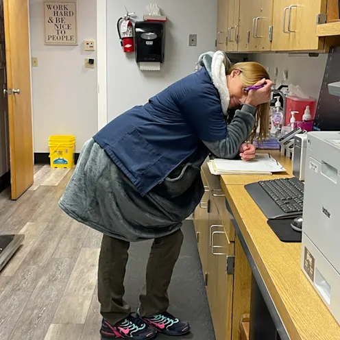 Working at Desk at Ferry Farm Animal Clinic Working at Desk at Ferry Farm Animal Clinic