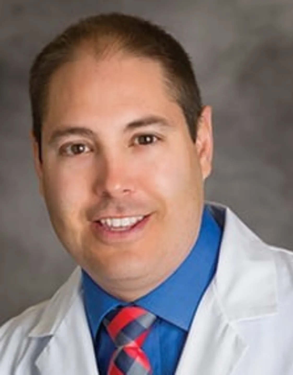 Dr. Adam Gonzales Dr. Adam Gonzales