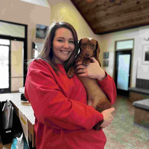 Our Staff with a Cute Dachshund Our Staff with a Cute Dachshund