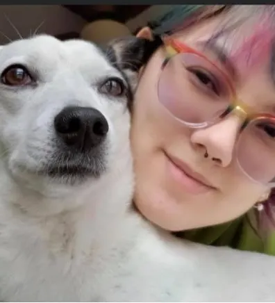 Shoko with small black and white dog Shoko with small black and white dog