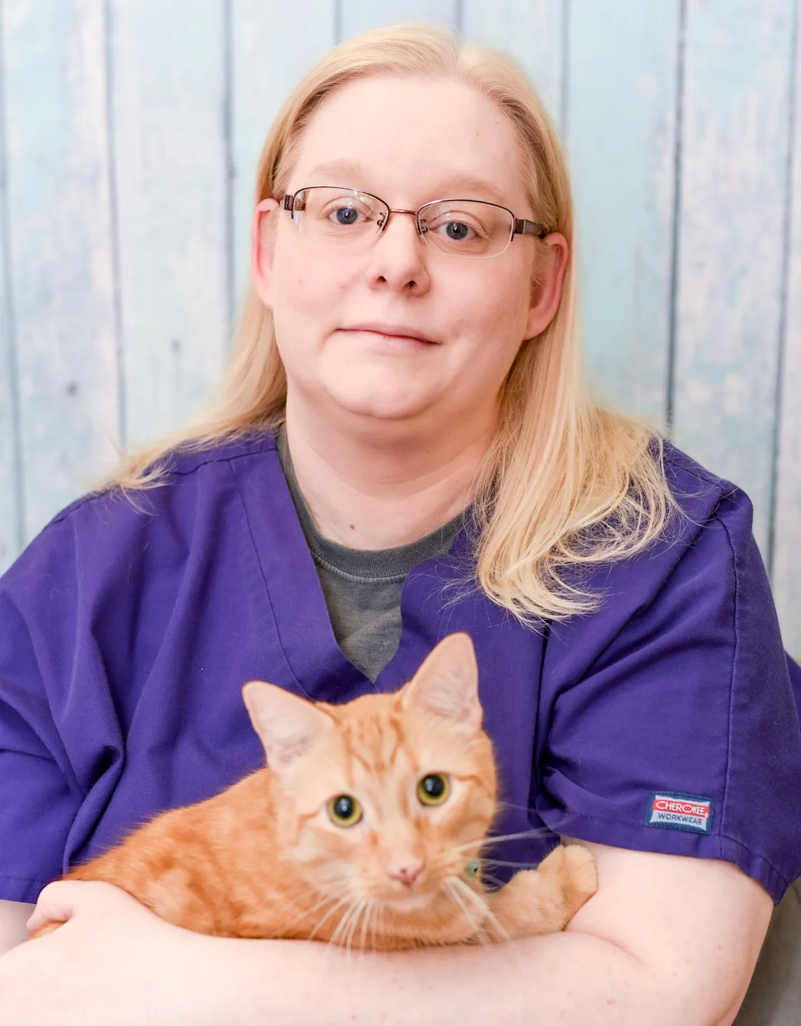 Clar holding tabby cat Clar holding tabby cat