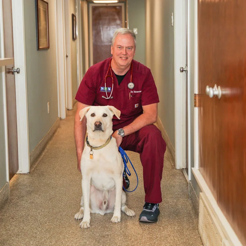 Scott Tobermann with a Dog Scott Tobermann with a Dog
