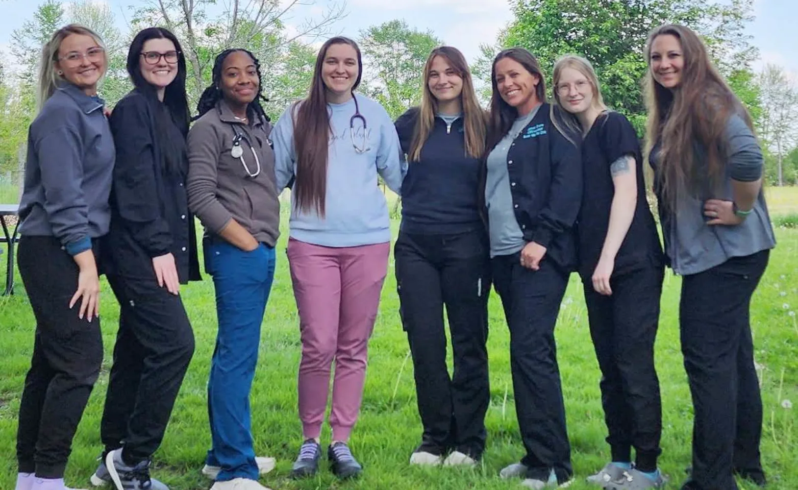 Picture of the staff of Seven Hills Pet Clinic posing outside. Picture of the staff of Seven Hills Pet Clinic posing outside.