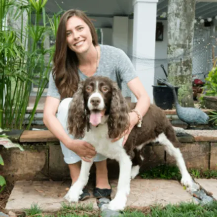 Meredith Addison with a brown/white dog