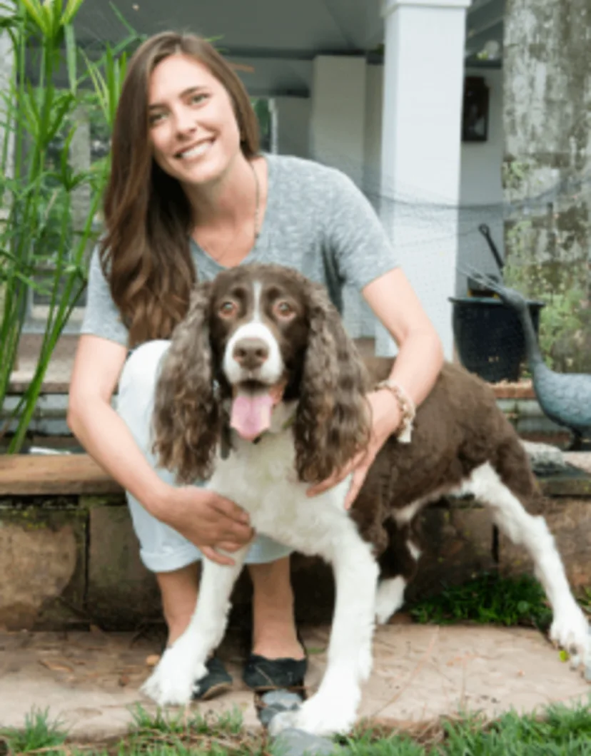 Meredith Addison with a brown/white dog