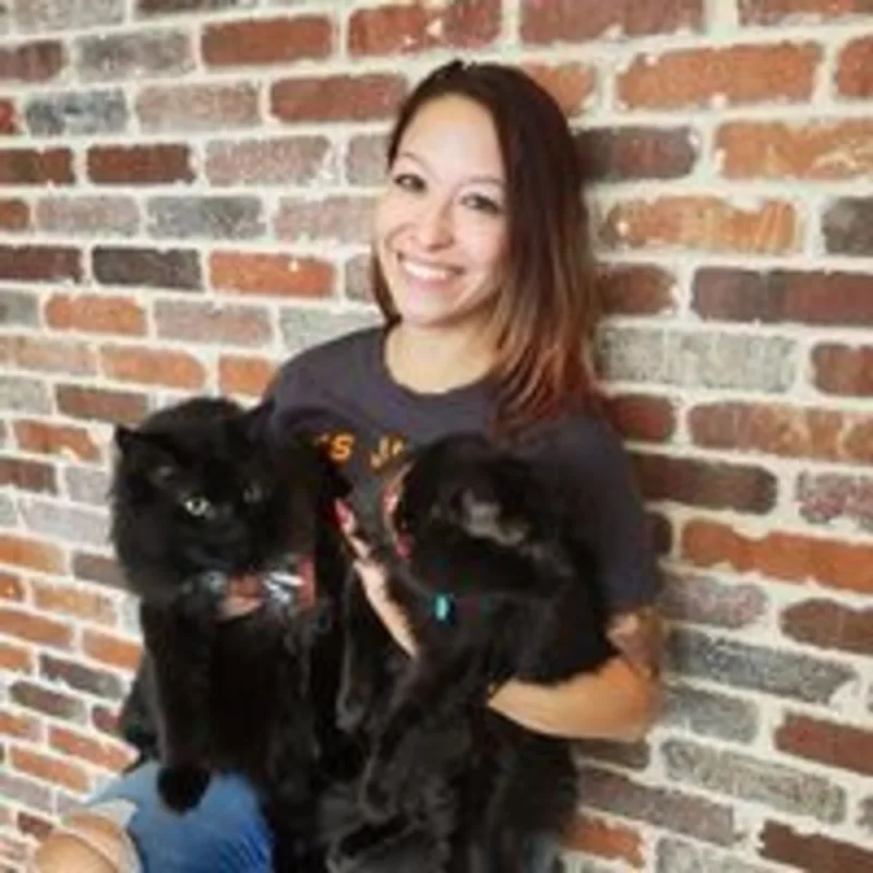 Nina Dudley with a cat Nina Dudley with a cat