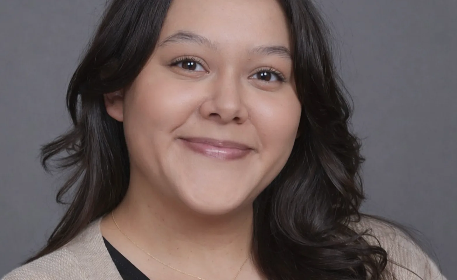 Letty Bonilla headshot in black shirt and beige cardigan sweater Letty Bonilla headshot in black shirt and beige cardigan sweater