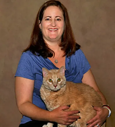 Dr. Rebecca Matchette holding a cat Dr. Rebecca Matchette holding a cat