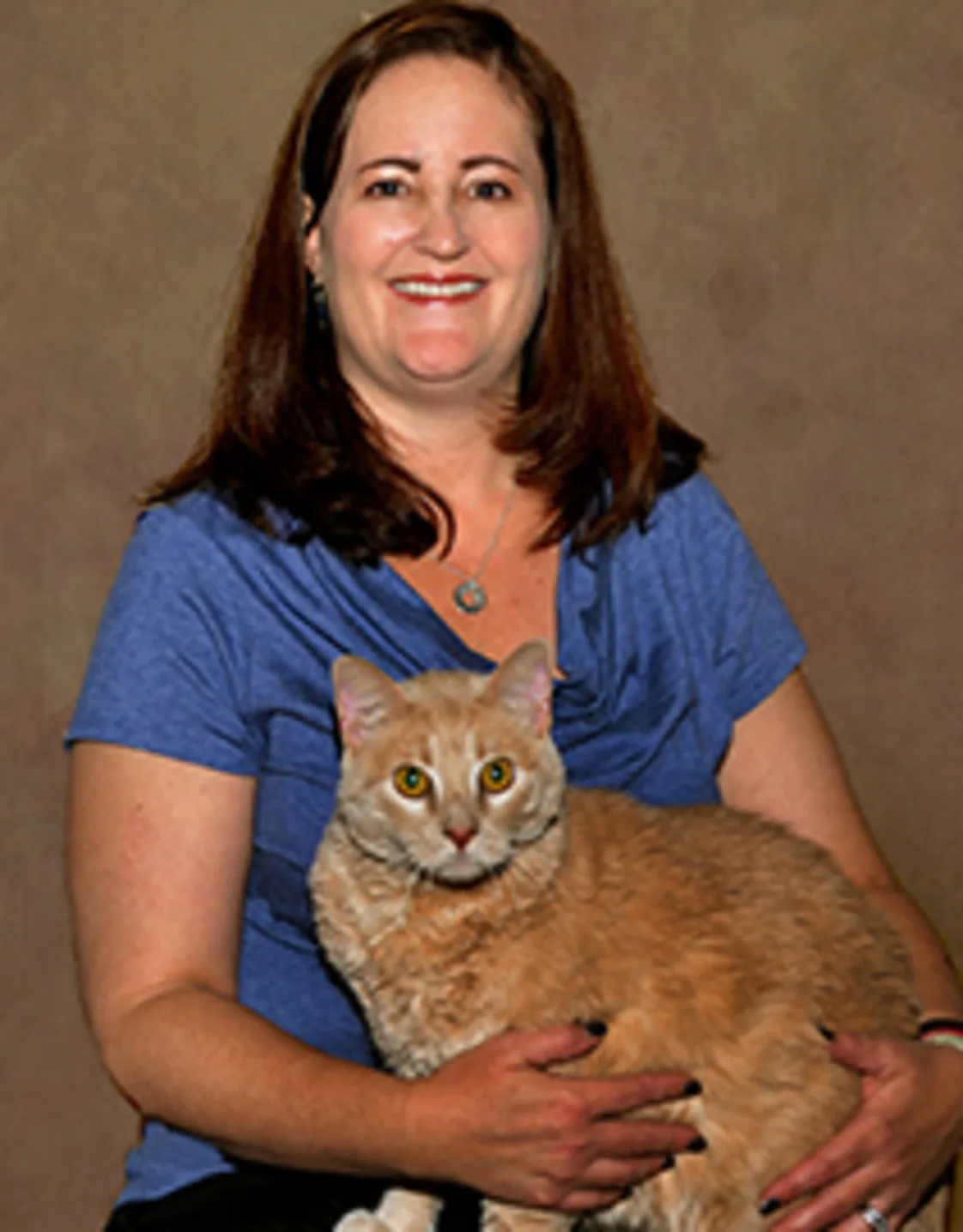 Dr. Rebecca Matchette holding a cat Dr. Rebecca Matchette holding a cat