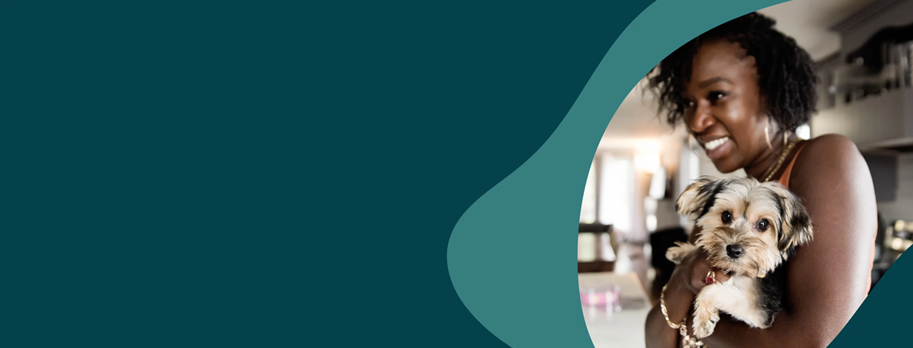 Woman holding a small dog in her arms Woman holding a small dog in her arms