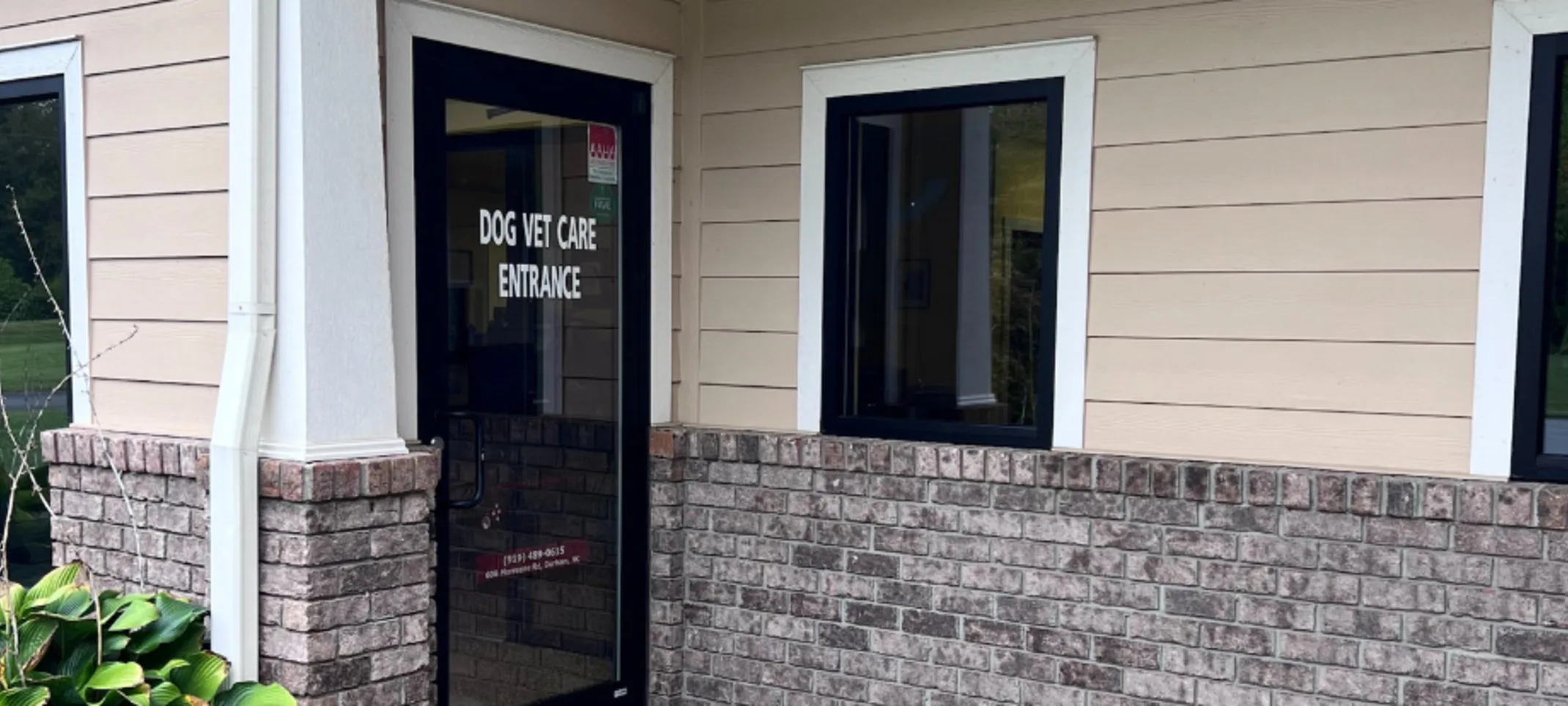 Dog vet care entrance door of the Roxboro Animal Hospital