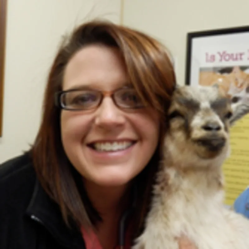Dr. Emily Lawrence with goat Dr. Emily Lawrence with goat