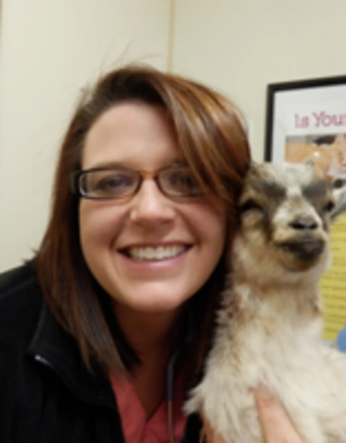 Dr. Emily Lawrence with goat Dr. Emily Lawrence with goat
