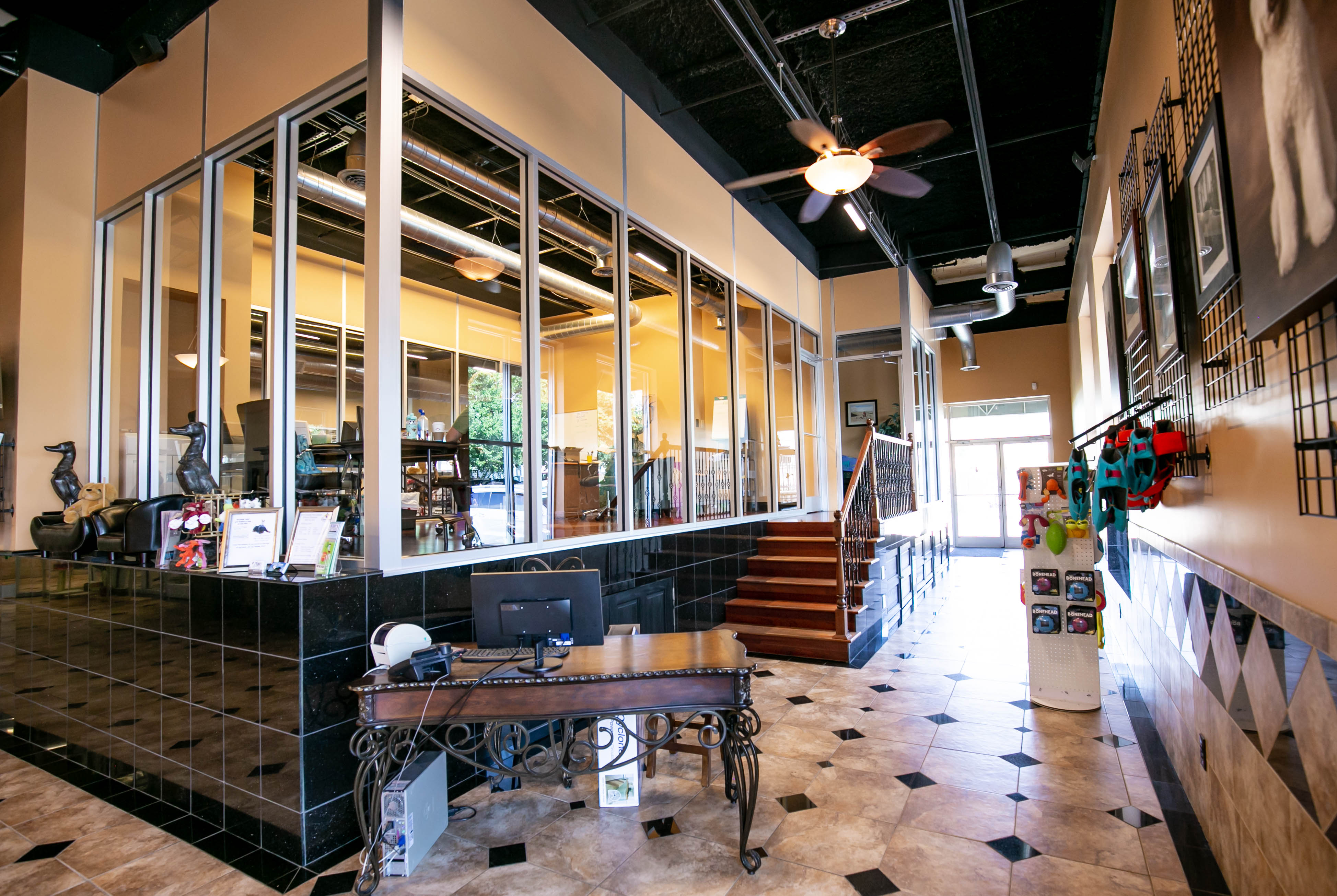 Uptown Hounds Lobby shows a very modern look and marble floors. 