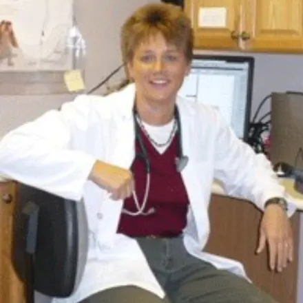 Dr. Tammy Hornak Sitting on their desk