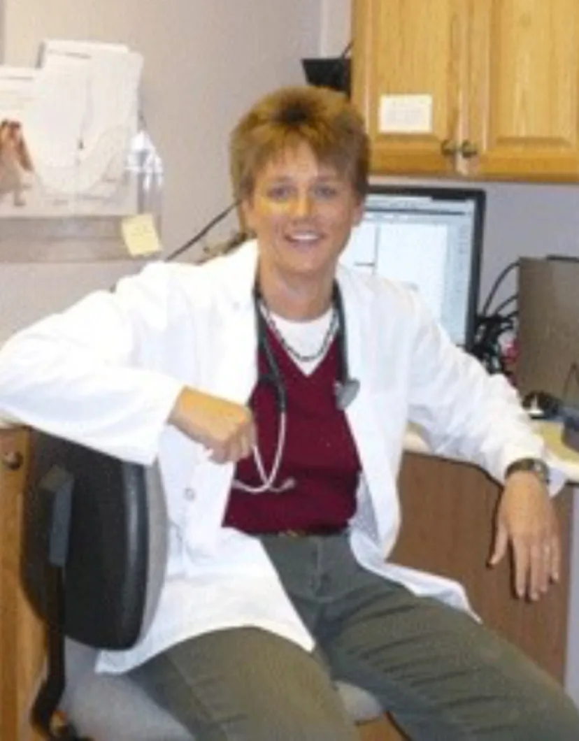 Dr. Tammy Hornak Sitting on their desk