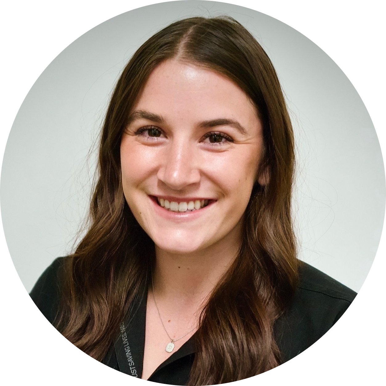 Cecily Momeyer VA wearing a black shirt, smiling in headshot