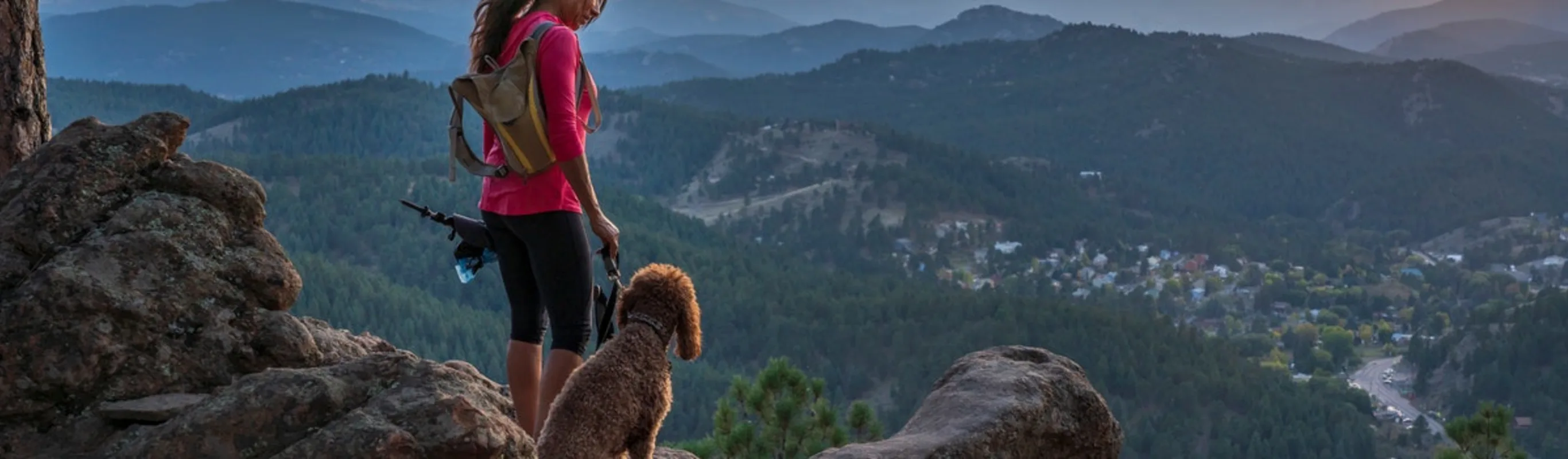 Woman on a hike with dog