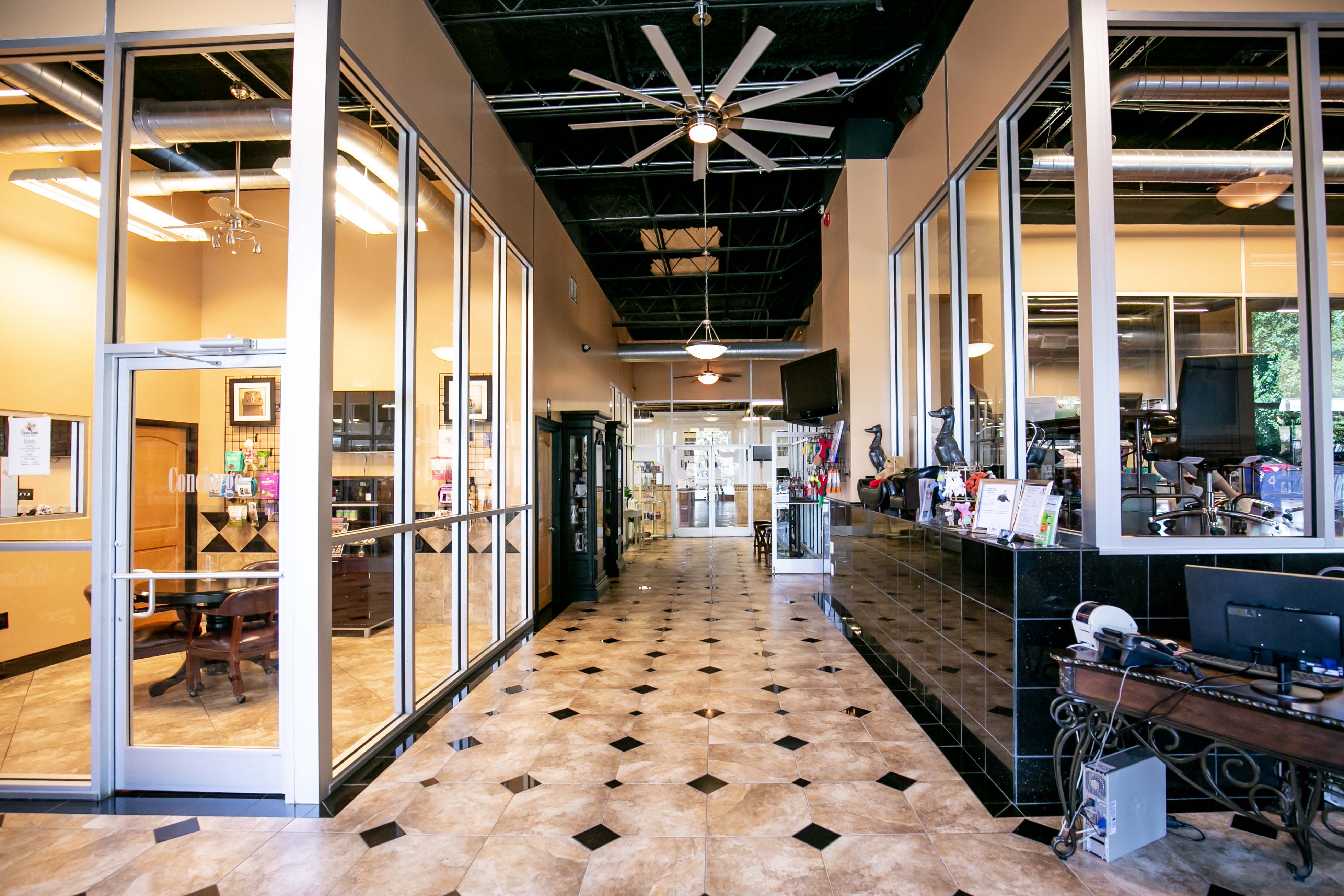 Uptown Hounds Facility Interior shot.  Very open layout with open walls to see each room. 