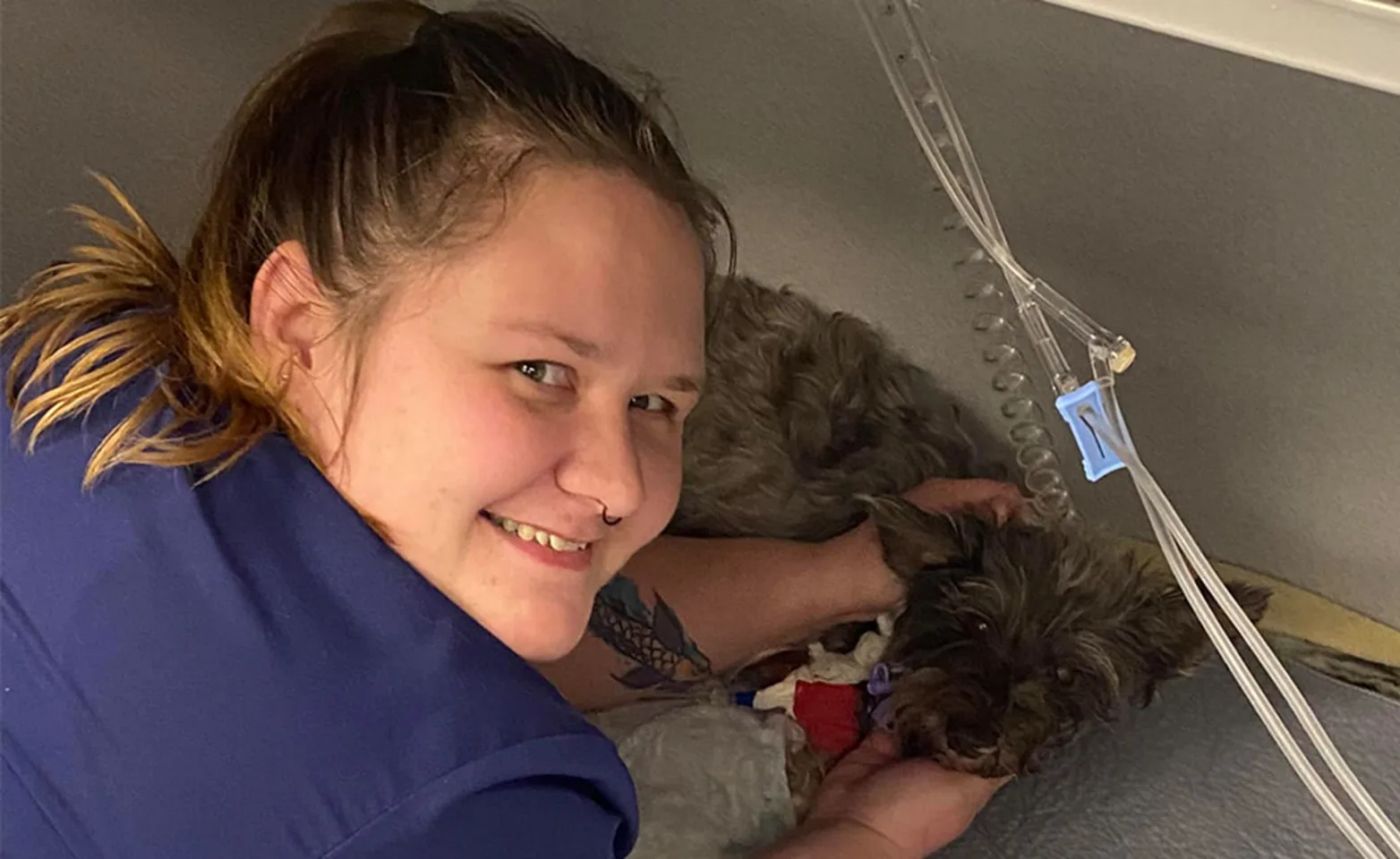 Staff member with a dog Staff member with a dog