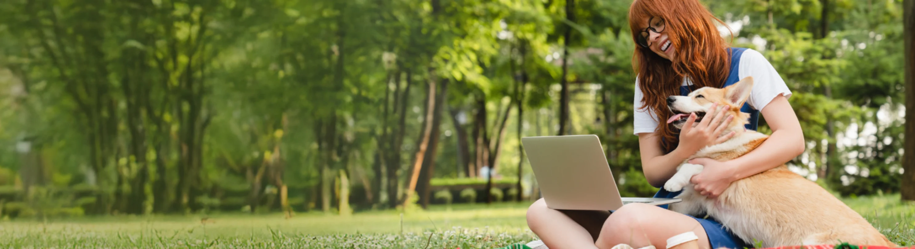 Girl Sitting at a Park with Her Laptop & Dog Girl Sitting at a Park with Her Laptop & Dog