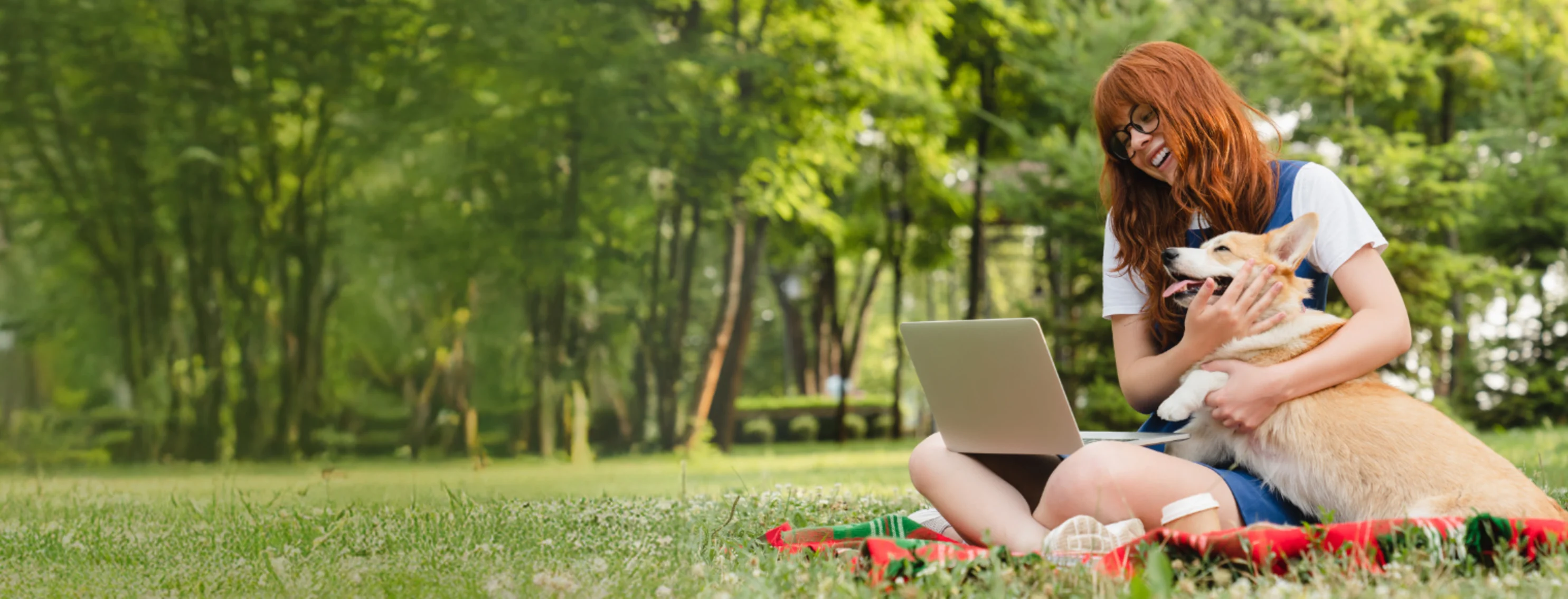 Girl Sitting at a Park with Her Laptop & Dog Girl Sitting at a Park with Her Laptop & Dog