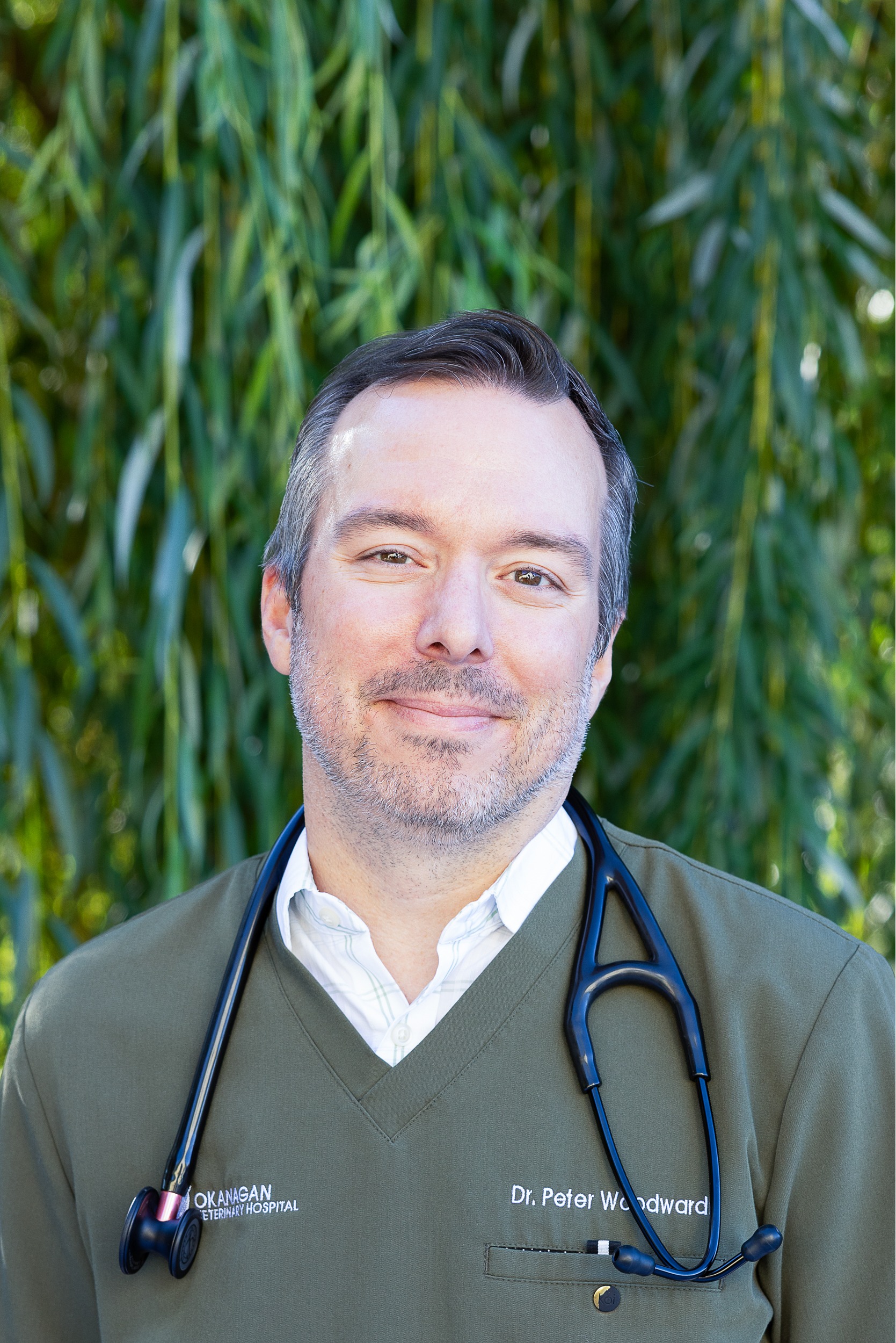 Dr. Peter Woodward holding a cat.