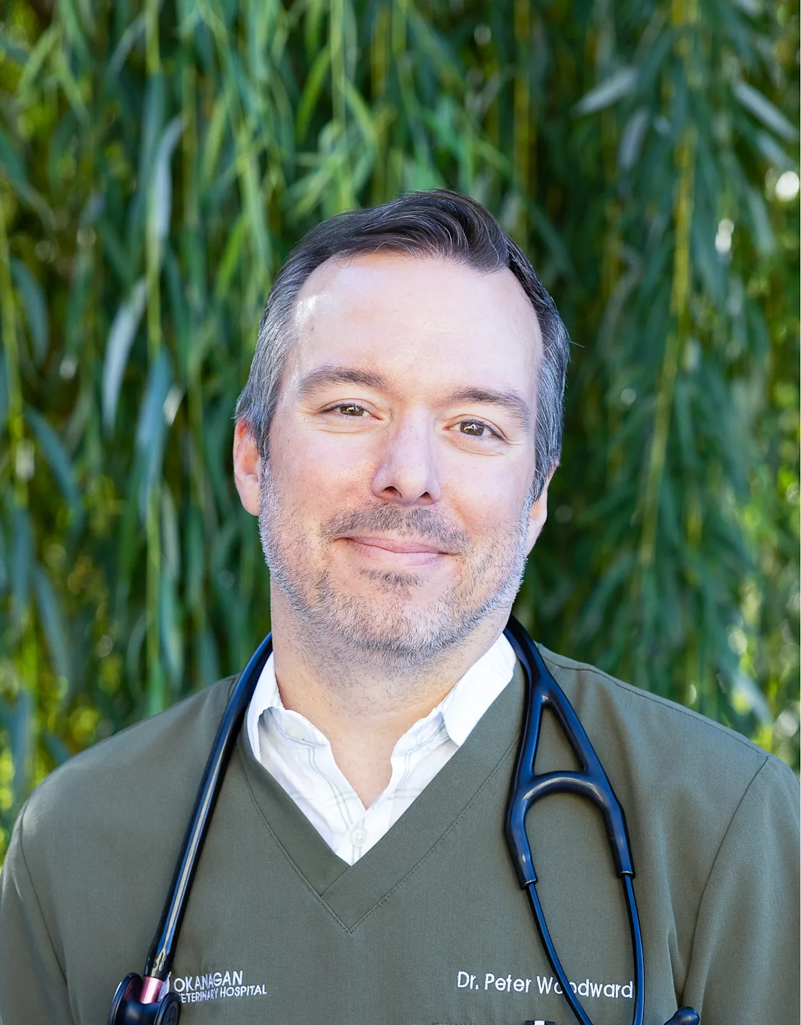 Dr. Peter Woodward holding a cat. Dr. Peter Woodward holding a cat.