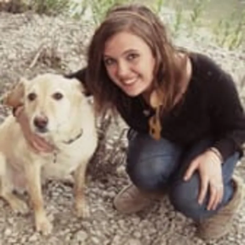 Megan Parker outside with a dog Megan Parker outside with a dog