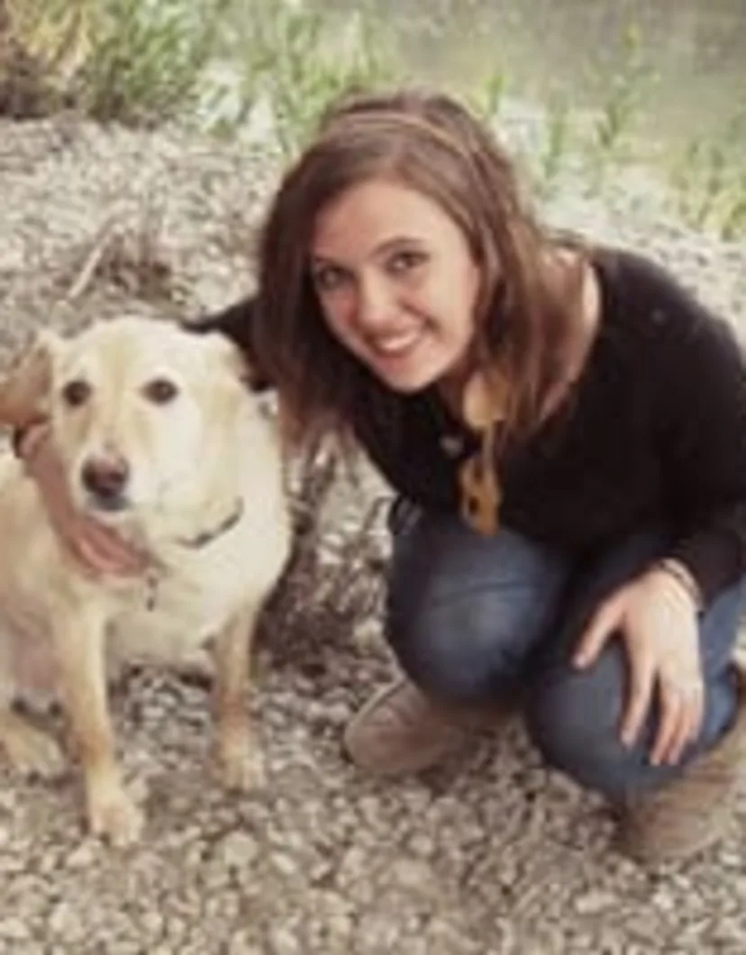 Megan Parker outside with a dog