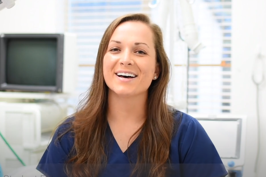 Nurse wearing blue scrubs at AMC Hattiesburg