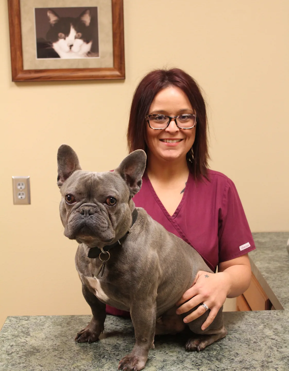Lauryn at Dunes Animal Hospital, with dog Lauryn at Dunes Animal Hospital, with dog
