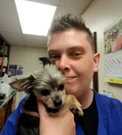 Kristi Stout holding a pet Kristi Stout holding a pet
