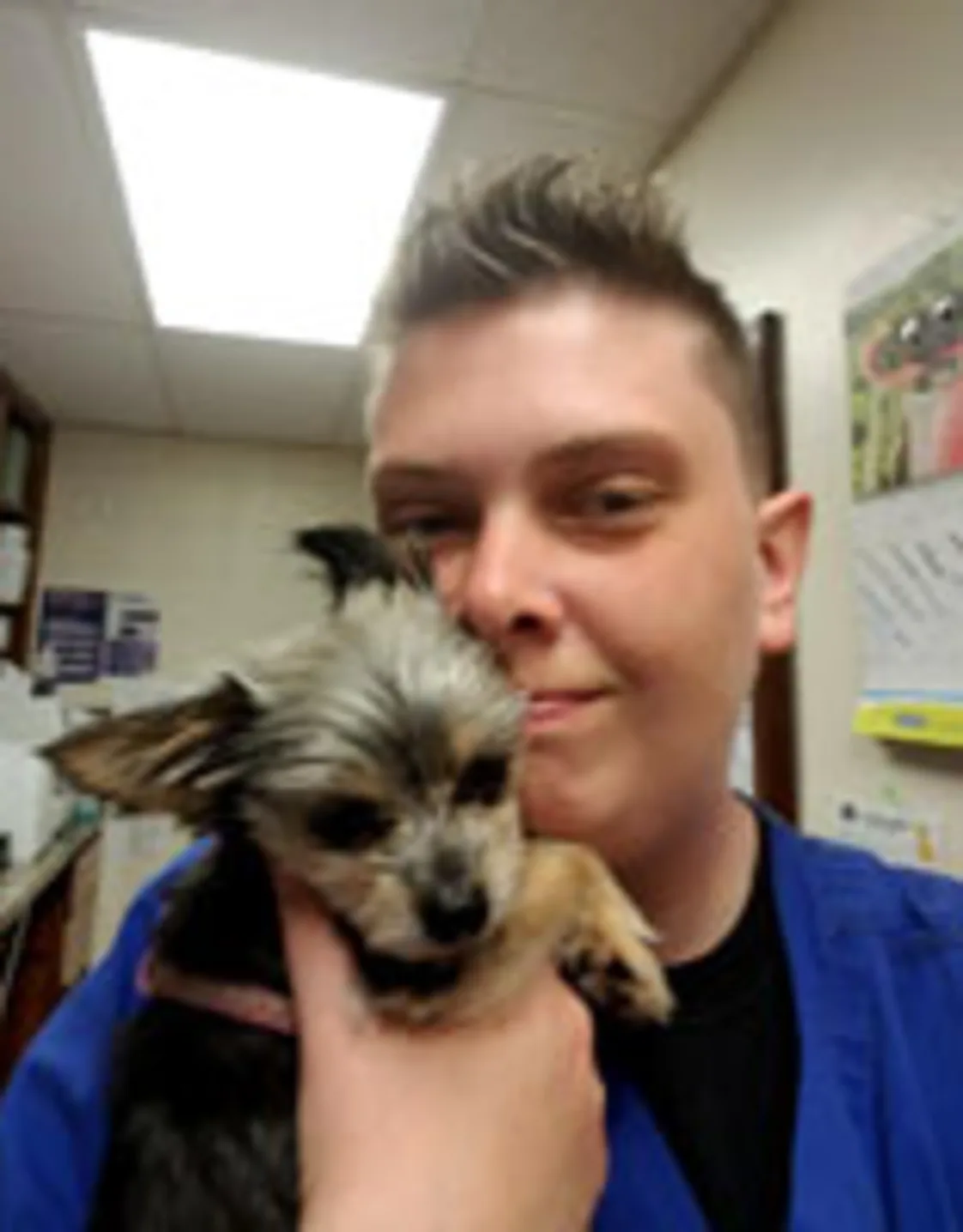 Kristi Stout holding a pet Kristi Stout holding a pet