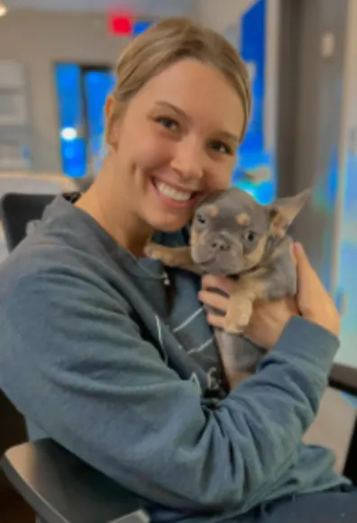 Alex (Staff) with French Bulldog Puppy Alex (Staff) with French Bulldog Puppy