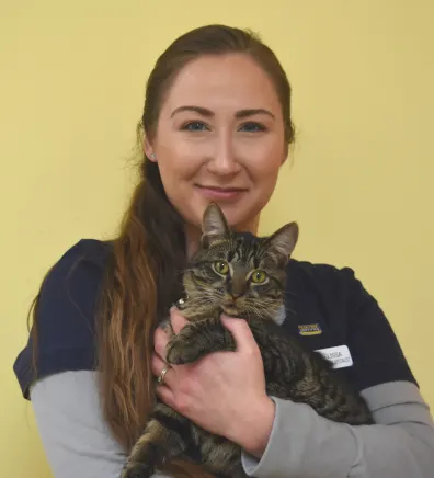 Melissa holding tabby cat