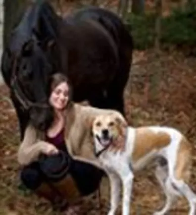 Haley from Midland Animal Clinic with horse and dog Haley from Midland Animal Clinic with horse and dog