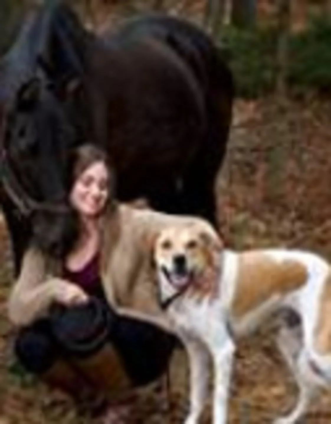 Haley from Midland Animal Clinic with horse and dog Haley from Midland Animal Clinic with horse and dog