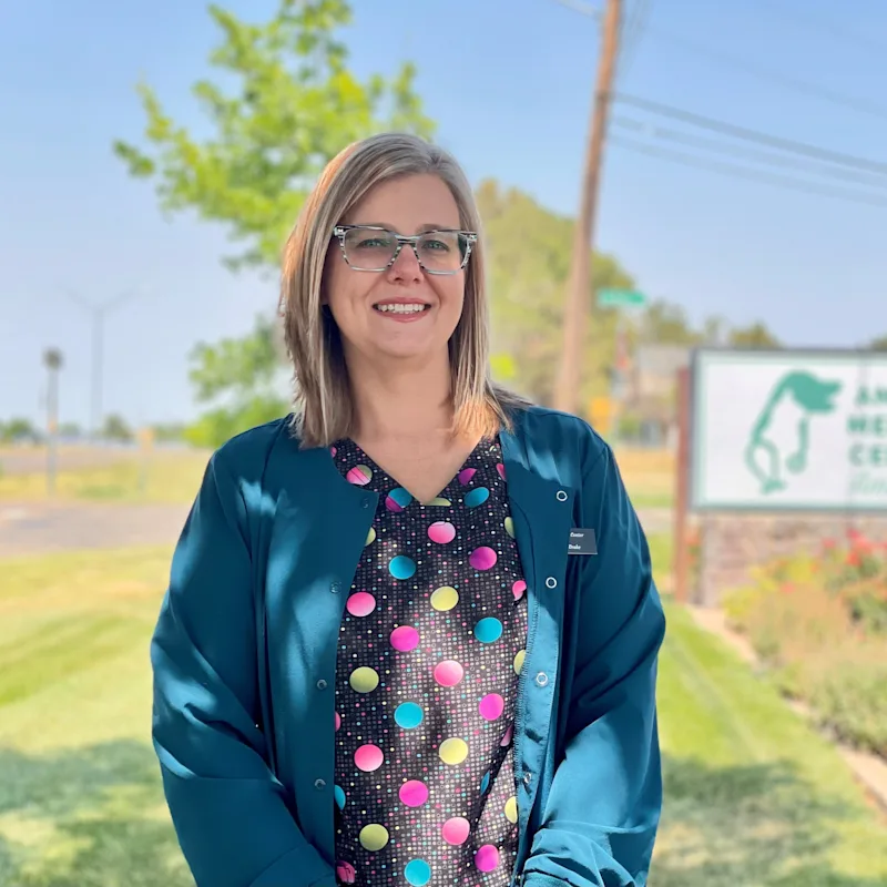 Dr. Amanda Drake with 2 dogs Dr. Amanda Drake with 2 dogs