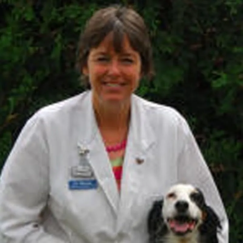 Dr. Elizabeth Thorson's staff photo from Stillwater Veterinary Clinic where she's posing with her black and white cockerspaniel outside. Dr. Elizabeth Thorson's staff photo from Stillwater Veterinary Clinic where she's posing with her black and white cockerspaniel outside.