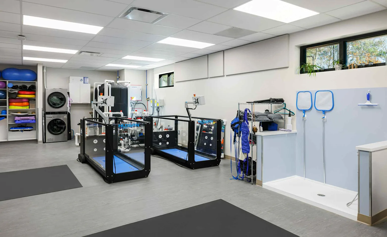 Two underwater treadmills sitting next to each other. Two underwater treadmills sitting next to each other.